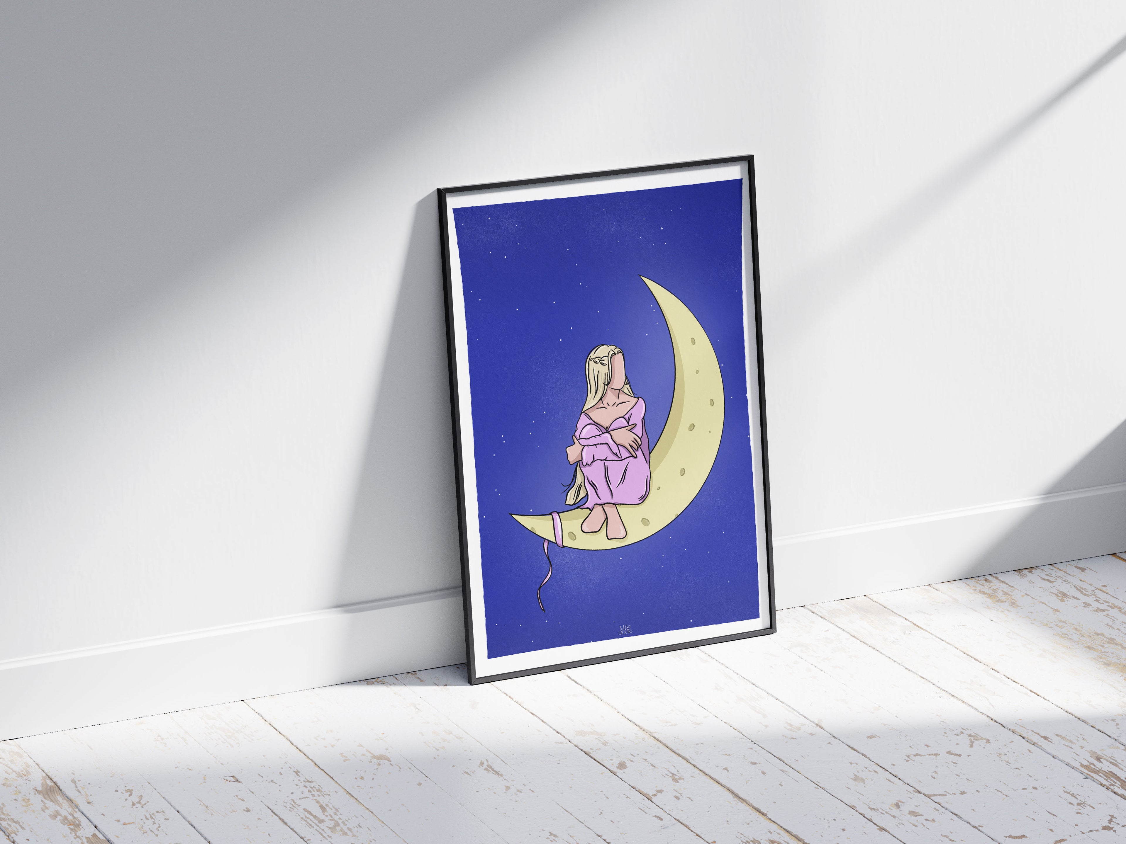 Image d’un cadre avec une illustration d’une femme assise sur la lune