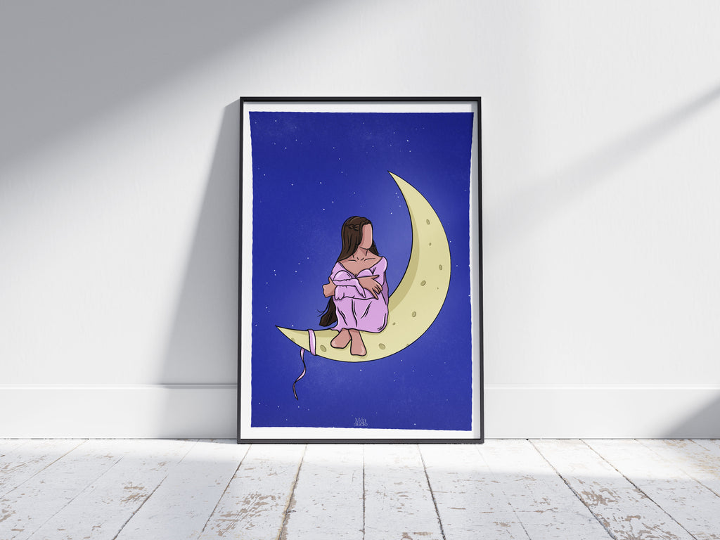 Image d’un cadre avec une illustration d’une femme assise sur la lune