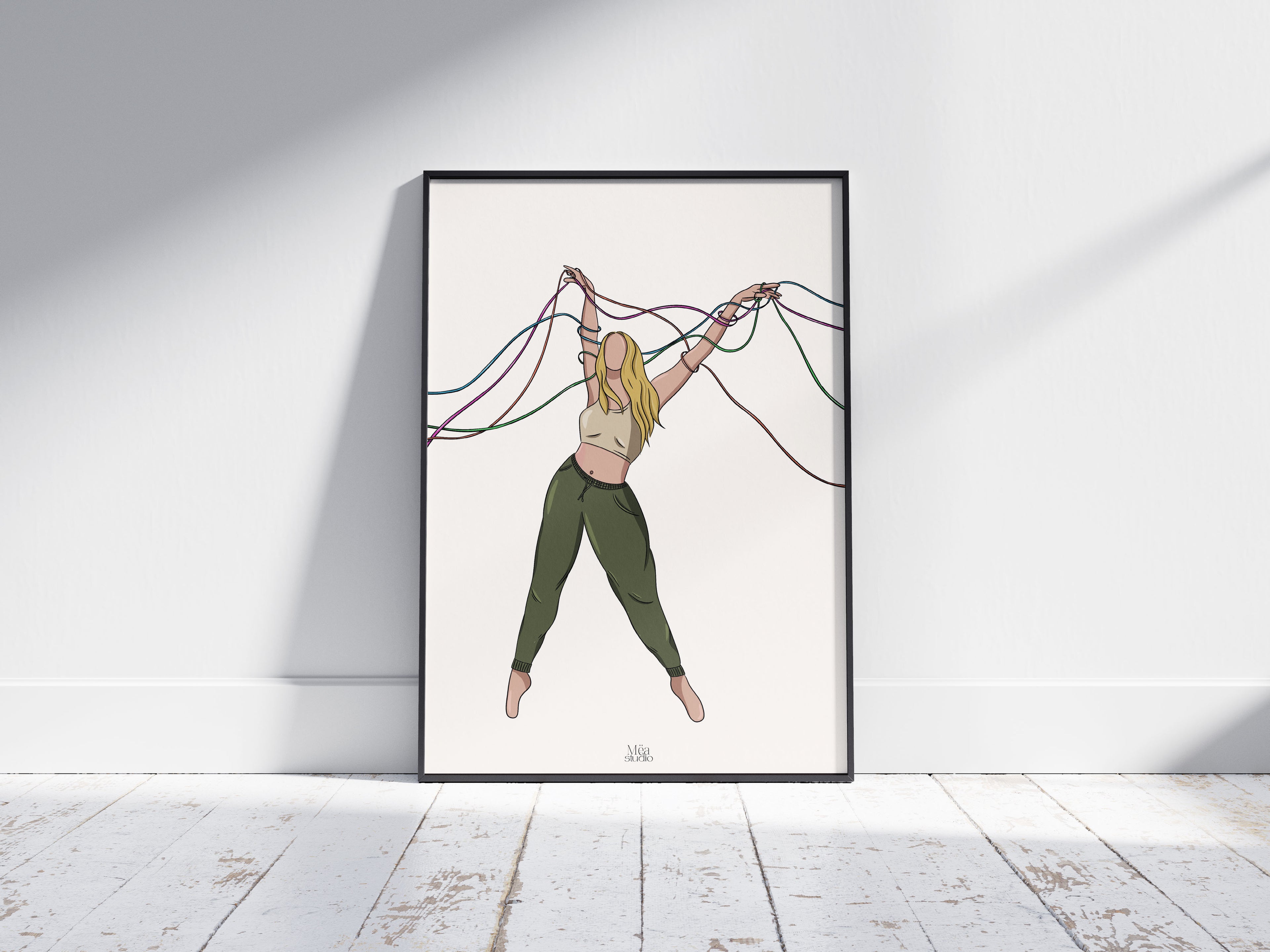 Photo d’un cadre, d’une illustration d’une femme avec des rubans qui s’entremêlent autour d’elle. 