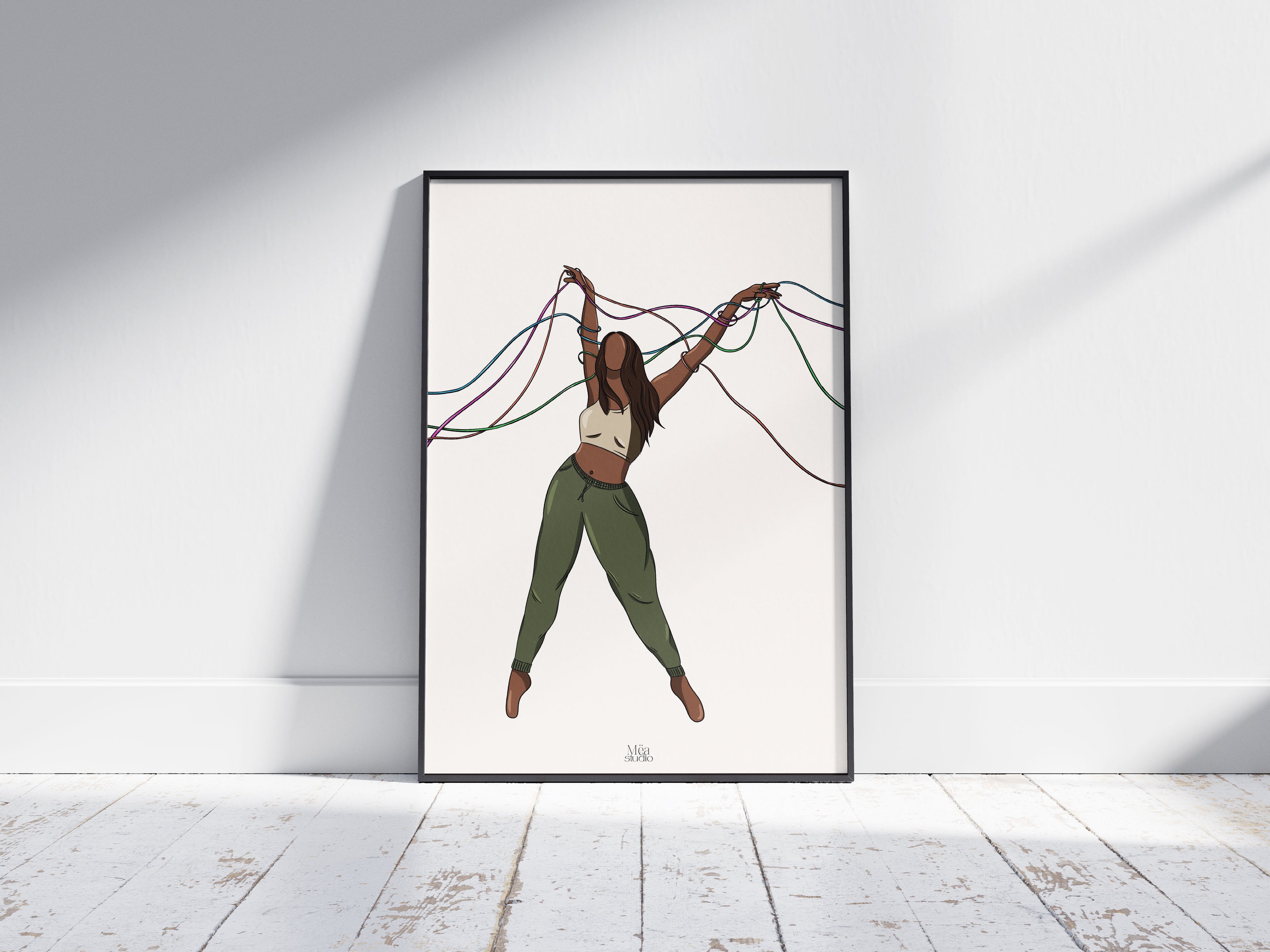 Photo d’un cadre, d’une illustration d’une femme avec des rubans qui s’entremêlent autour d’elle. 